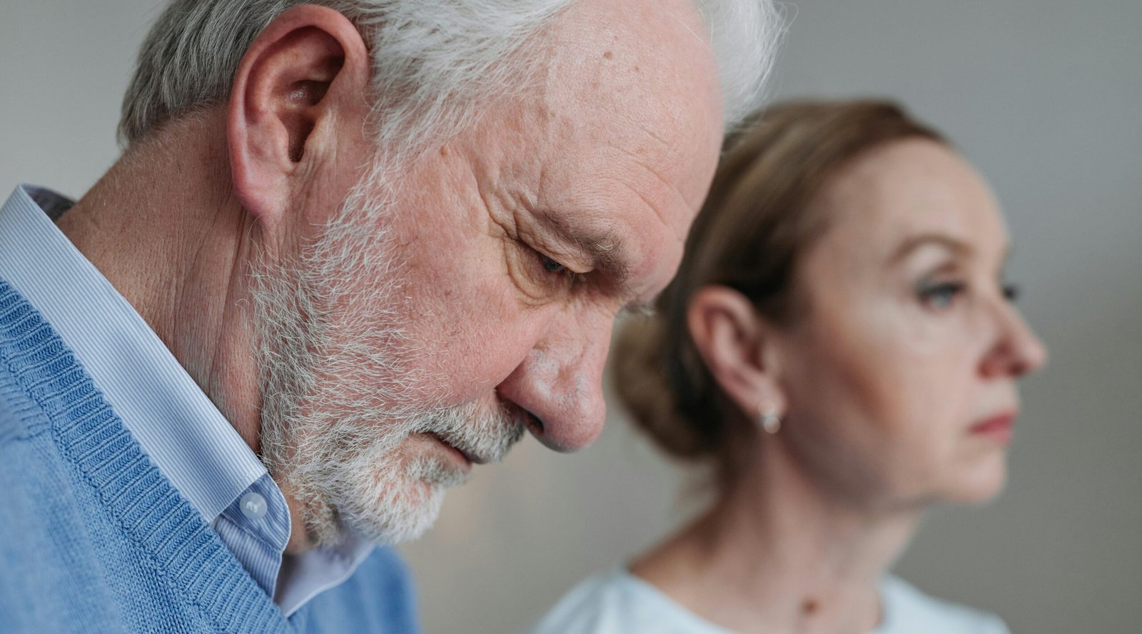 Worried senior couple facing memory problems